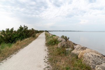 Fototapeta na wymiar walking path and bike on the beach of Fouras Charente in France