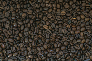 Roasted coffee beans background.