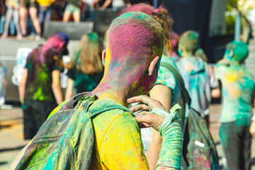 people in the paint at the festival