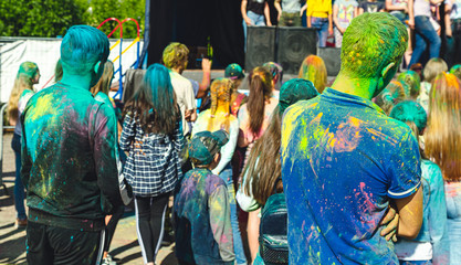 people in the paint at the festival