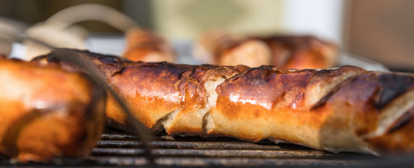 grill sausages on the coal grill