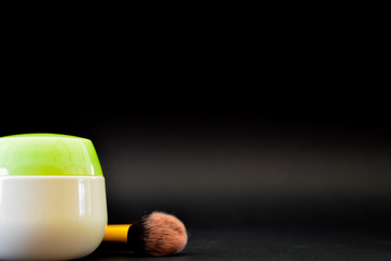 A bottle of household chemicals cosmetics on a black background neck of a bottle close up macro...