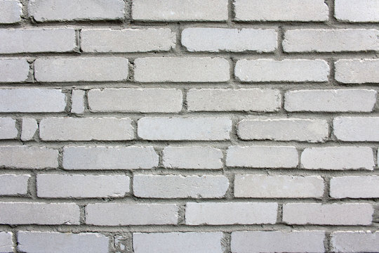 Fototapeta Tło w stylu wabi-sabi: stary mur z szarych cegieł