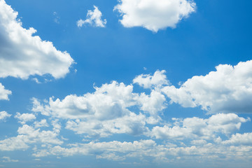 Bright beautiful blue sky with clouds for background or texture