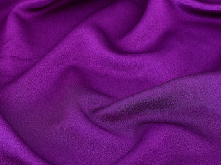 Fototapeta na wymiar shiny purple fabric background
