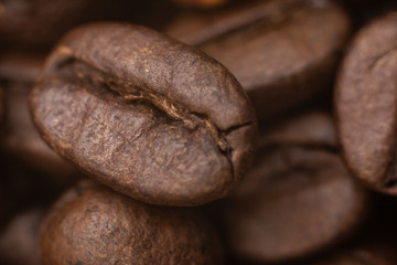 Coffee beans background. Coffee seeds pattern texture. Black morning coffee beans. Coffee concept.