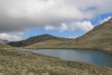 Fototapeta na wymiar Panorama of lake scenes in mountains, national park Dombay, Caucasus