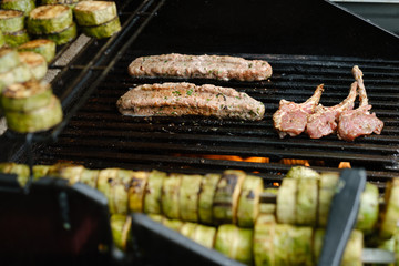 Marinated grilled lamb. Meat, smoke and charcoal heat.