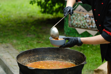 Bograch. Soup with paprika, meat, bean, vegetable, dumpling. Traditional Hungarian Goulash in...