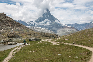 Panorama of Riffelsee lake and Matterhorn mountain in national park Zermatt