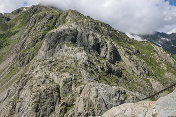Panorama view of Trift Bridge in national park Switzerland