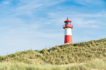  Lighthouse red white on dune. Sylt island – North Germany.  