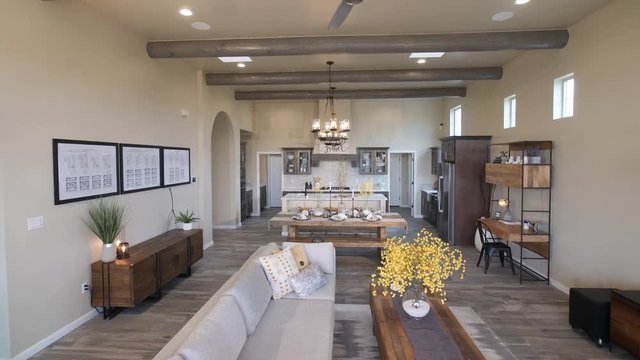 Living Room Big Space Open Floor Plan Lower. view moves down on a large room with living room, dining room and kitchen in open concept