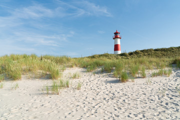 Lighthouse red white on dune. Sylt island &ndash; North Germany.  