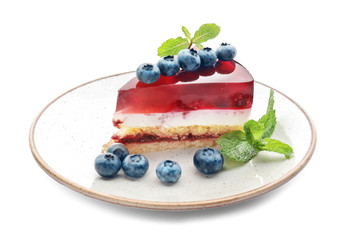 Tasty blueberry cheesecake on white background