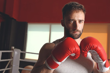 Sporty man in boxing ring