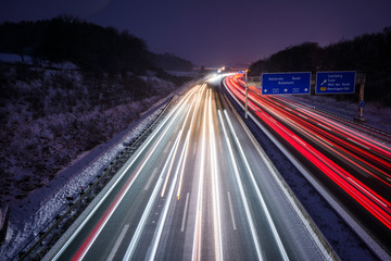 Freeway at night high traffic on lanes