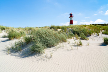 Lighthouse red white on dune. Sylt island – North Germany.  