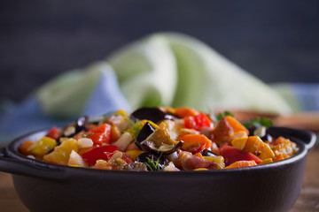 Vegetable stew: aubergines, paprika pepper, tomatoes, zucchini, carrots and onions. Stewed vegetable salad
