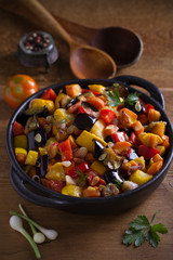 Vegetable stew: aubergines, paprika pepper, tomatoes, zucchini, carrots and onions. Stewed vegetable salad