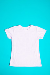 white cotton t shirt mock up on blue background