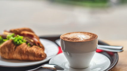 Cappuccino and croissant with a complex filling, Breakfast, lunch