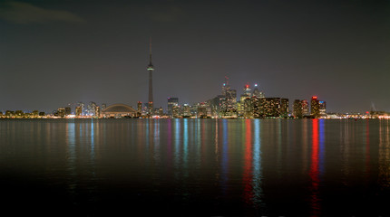 Toronto skyline over the lake at night