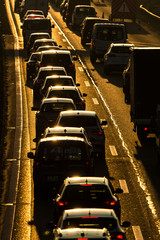 Heavy morning city traffic/congestion concept - cars going very slowly in a traffic jam during the morning rushhour