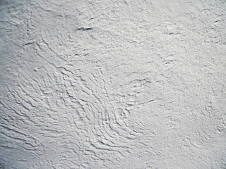 Aerial view above snowy plain  on a winter frosty day