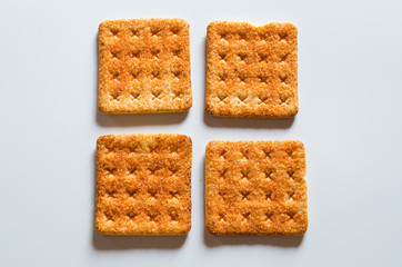 crackers with sugar on white background
