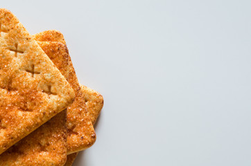 crackers with sugar on white background