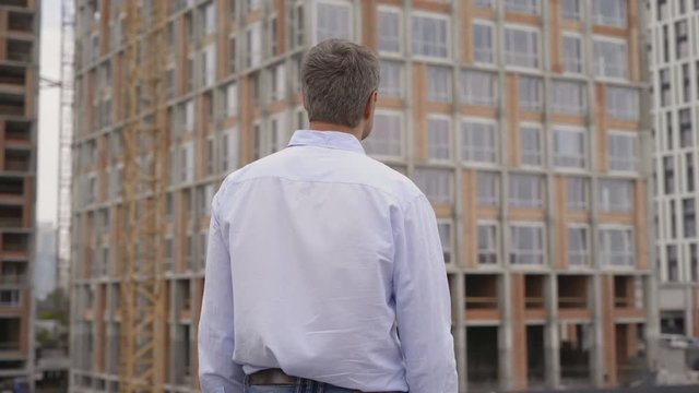 Cheerful Business Man Celebrating Success Outdoors 4K
