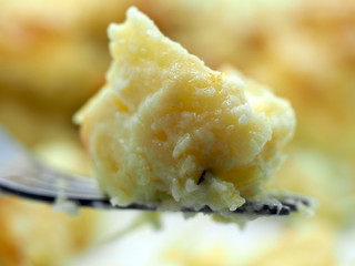 London, UK - July 2019 – Main Course – A Fork Full Of Baked Macaroni & Cheese Pasta With Fresh Jalapeños & A Cheesy Crumb For Dinner