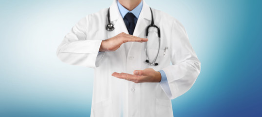 hands doctor close up, medical coverage insurance concept, isolated on blue blurred  background...