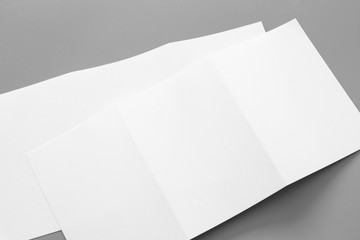 Blank portrait mock-up paper. brochure magazine isolated on gray, changeable background / white paper isolated on gray