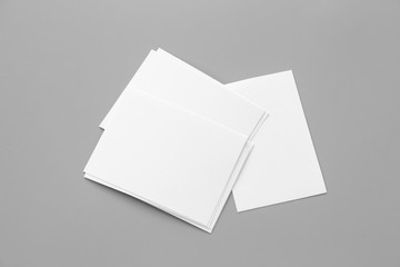 Blank portrait mock-up paper. brochure magazine isolated on gray, changeable background / white paper isolated on gray