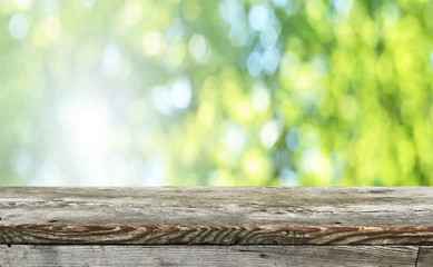 Empty wooden table background for display montages