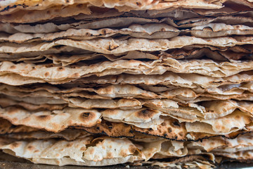 Texture of traditional turkish pide or pita bread. Also known as yufka ekmek. Tandir pita ekmek background. Traditional Turkish food cuisine culture. Turkish village Breakfast.