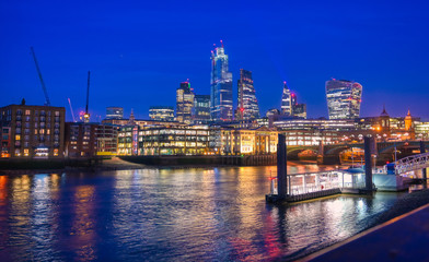 Fototapeta na wymiar A view of the London skyline across the River Thames in London, UK.