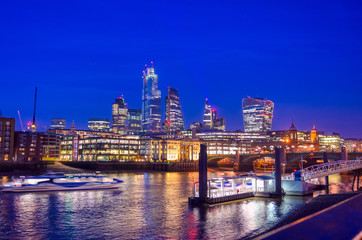 Obraz na płótnie Canvas A view of the London skyline across the River Thames in London, UK.