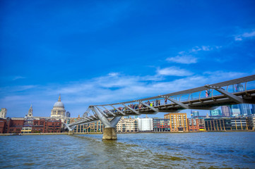 London, United Kingdom - April 18, 2019 - St. Paul's Cathedral across Millennium Bridge and the...