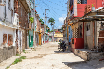 Residential neighborhood in a small Cuban Town during a cloudy and sunny day. Taken in Trinidad, Cuba.