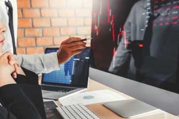 Business team deal Investment stock market discussing graph stock market trading Stock traders concept.