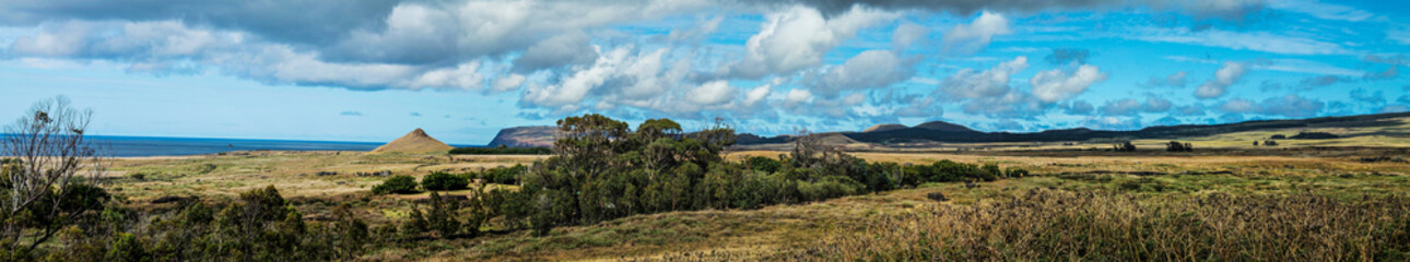 The slopes of Rano Raraku volcano, Easter Island, Chile, where ancient Rapa Nui people carved the iconic moai statues, blending culture, history, and breathtaking natural landscapes.