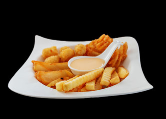 isolated white plate of mixed fries