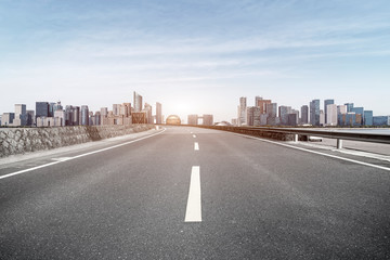 Road and skyline of urban architecture
