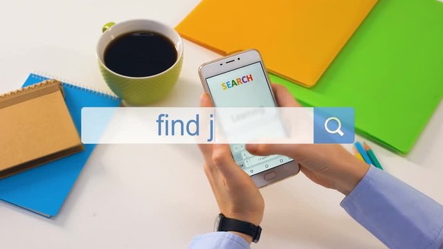 Find job phrase typed by unemployed female in search bar on phone, recruitment