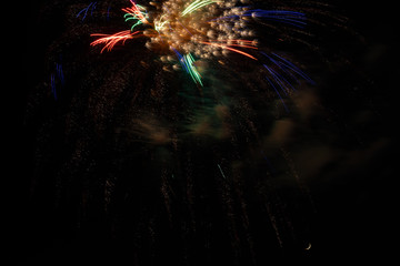 Beautiful Fireworks Exploding Aginst the Black Night Sky