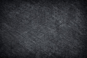 Dark grey black slate background or texture.