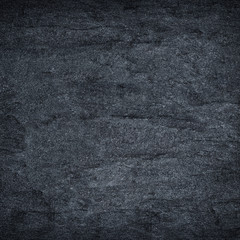 Dark grey black slate background or texture.